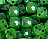 A pile of green Kroot dice with black pips and brown quilled crests