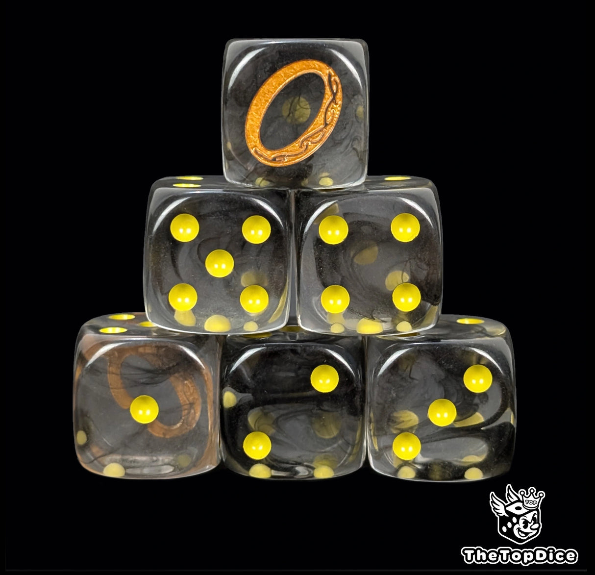 Clear black 16mm D6 dice with a gold ring emblem and yellow pips for epic fantasy wargames