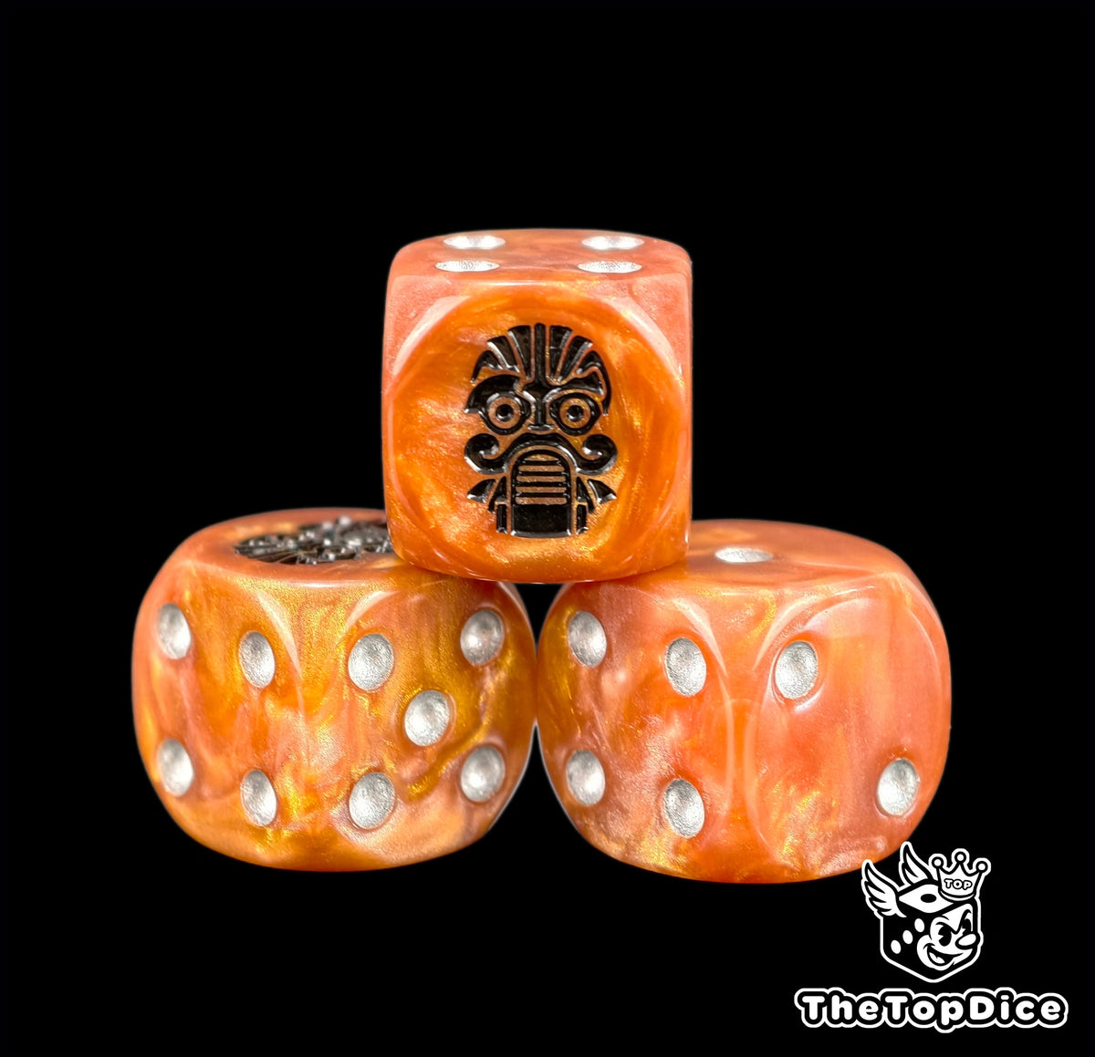 Three copper sky dwarf dice with silver pips and a black crest