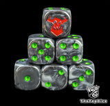Black resin D6 dice with a red orc emblem and green pips