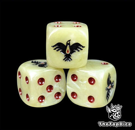 Close-up of a beige D6 die with a black raven and red blood drop