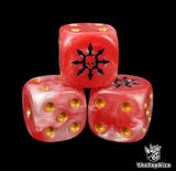Close up of a red 16mm resin D6 die engraved with a chaos star holding a black skull and gold pips