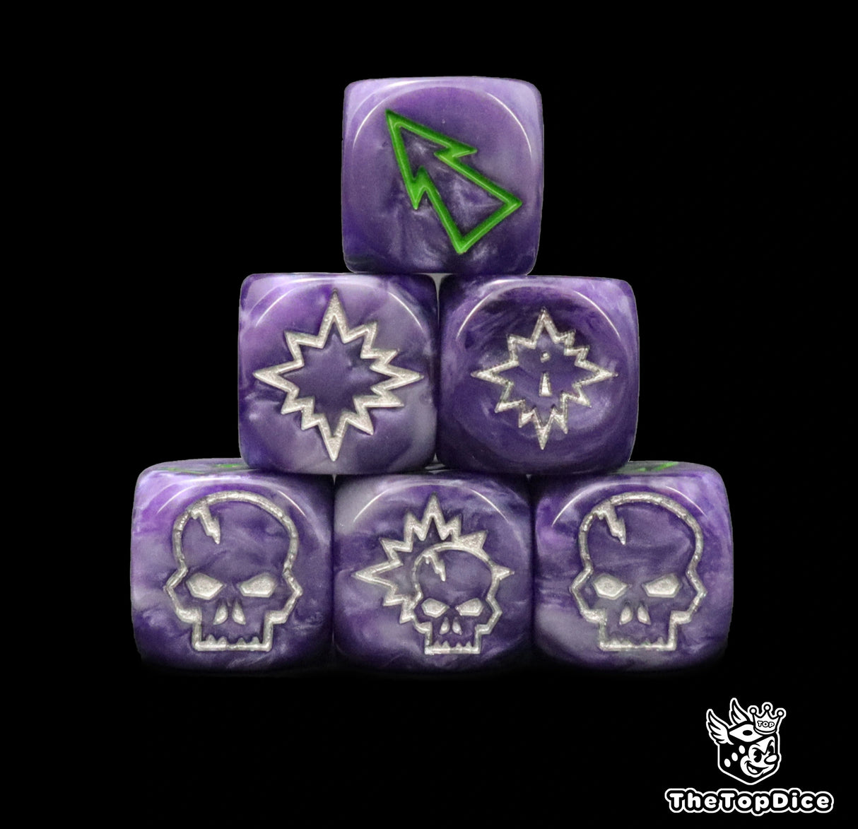 Close up of three purple 16mm block dice with green pips for resolving blocks