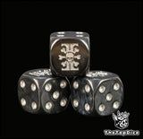 Close view of the silver xenos hunter skull engraved on a black 16mm D6