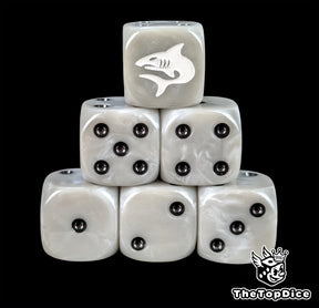 Grey resin D6 dice with a white shark emblem and black pips