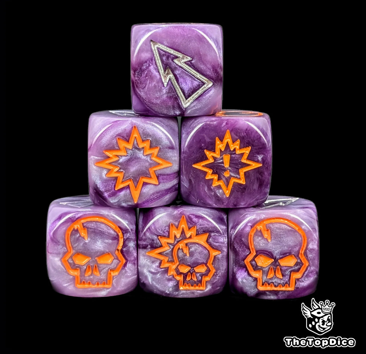 Close up of three purple 16mm block dice with silver pips for resolving blocks