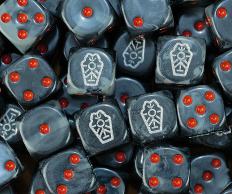 Pile of Canoptek tomb world Necron dice in black and grey with silver glyphs and orange pips