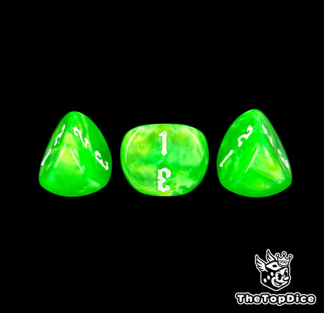 A closer look at three emerald 16mm D3 dice, digits filled by hand