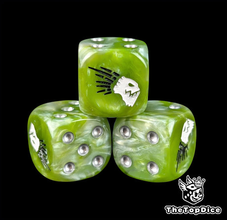 Close-up of a green D6 die with a white beaked alien face