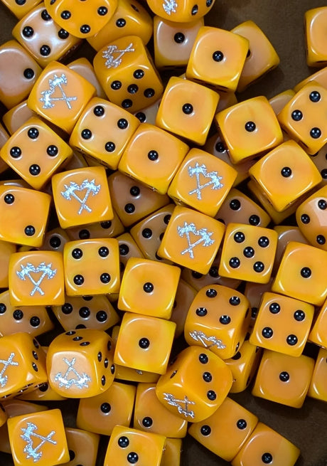 Pile of orange 16mm D6 dice with silver axe emblems for a fantasy dwarf army