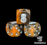 Close up of an orange 16mm resin D6 die engraved with a white rune and a stern face