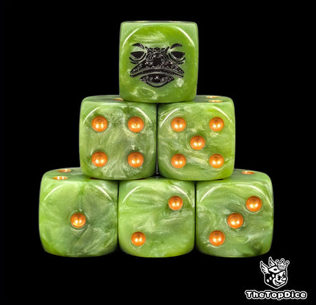 Close up of two green D6 with a black frog face logo on the six face for fantasy football