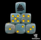 Close up of two sky blue D6 with a black triskelion logo on the six face for fantasy football
