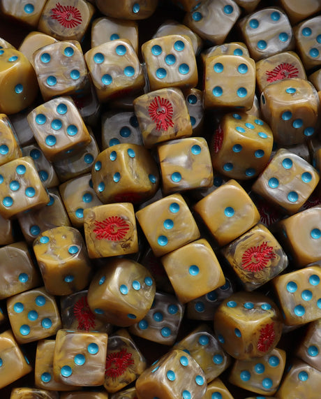 Pile of gold 16mm D6 dice with red eagles for a sci-fi elite army