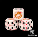 Three white Khorne dice flecked with red and a gold maw emblem