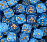 A pile of blue dwarf D6 with gold pips and gold mountain runes