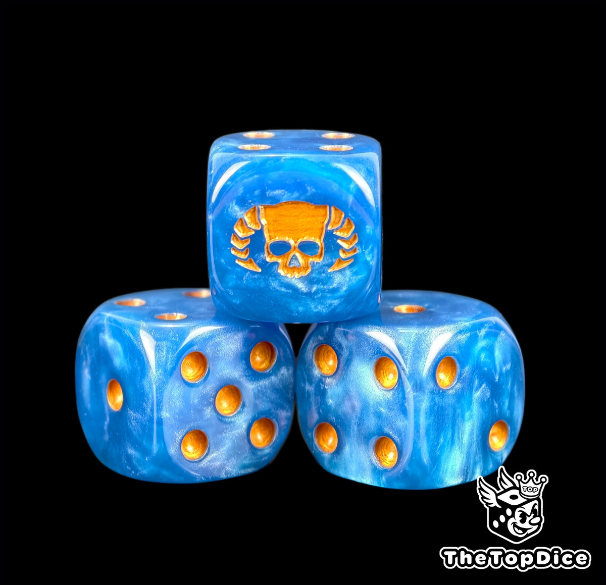 Three blue space marine Librarian dice with warm gold pips