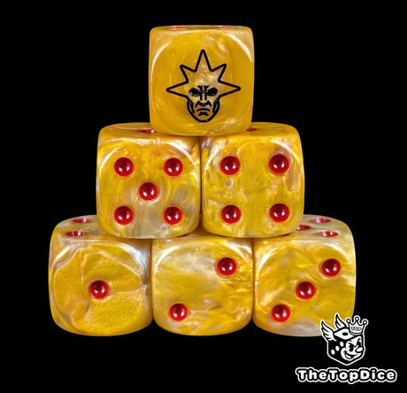 Gold 16mm D6 dice with a black winged angel mask emblem and red pips for sci-fi wargaming