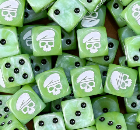 A pile of green Ratling D6 with black pips and white beret skulls