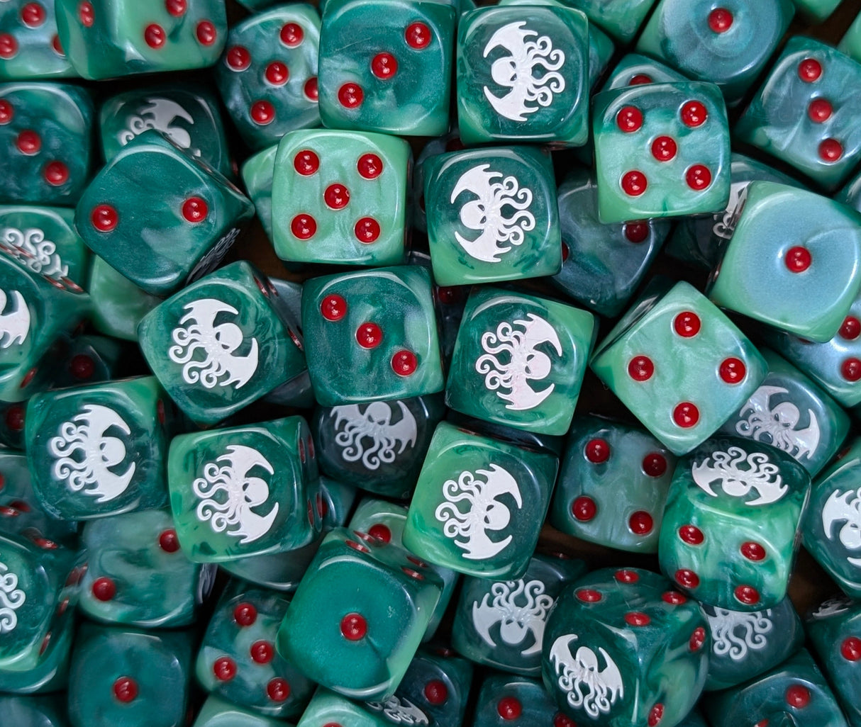 Pile of green Cthulhu cult 16mm D6 dice for an RPG horror campaign