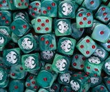 Pile of green Cthulhu cult 16mm D6 dice for an RPG horror campaign