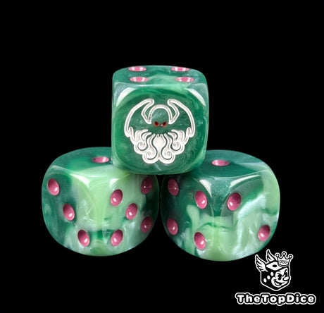 Close up of a green 16mm resin D6 die engraved with a white red-eyed Cthulhu and purple pips