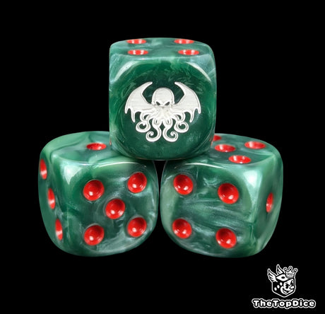 Close up of a green 16mm resin D6 die engraved with a white Cthulhu idol and red pips