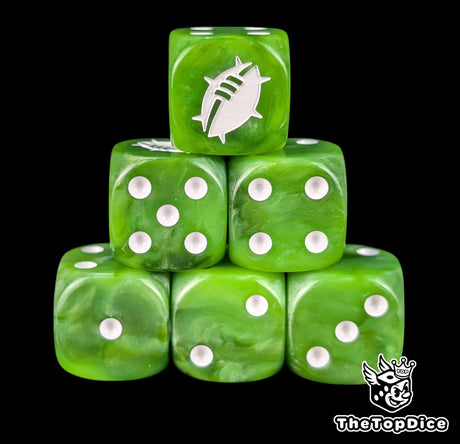 Close up of two green D6 with a white custom logo on the six face for fantasy football games