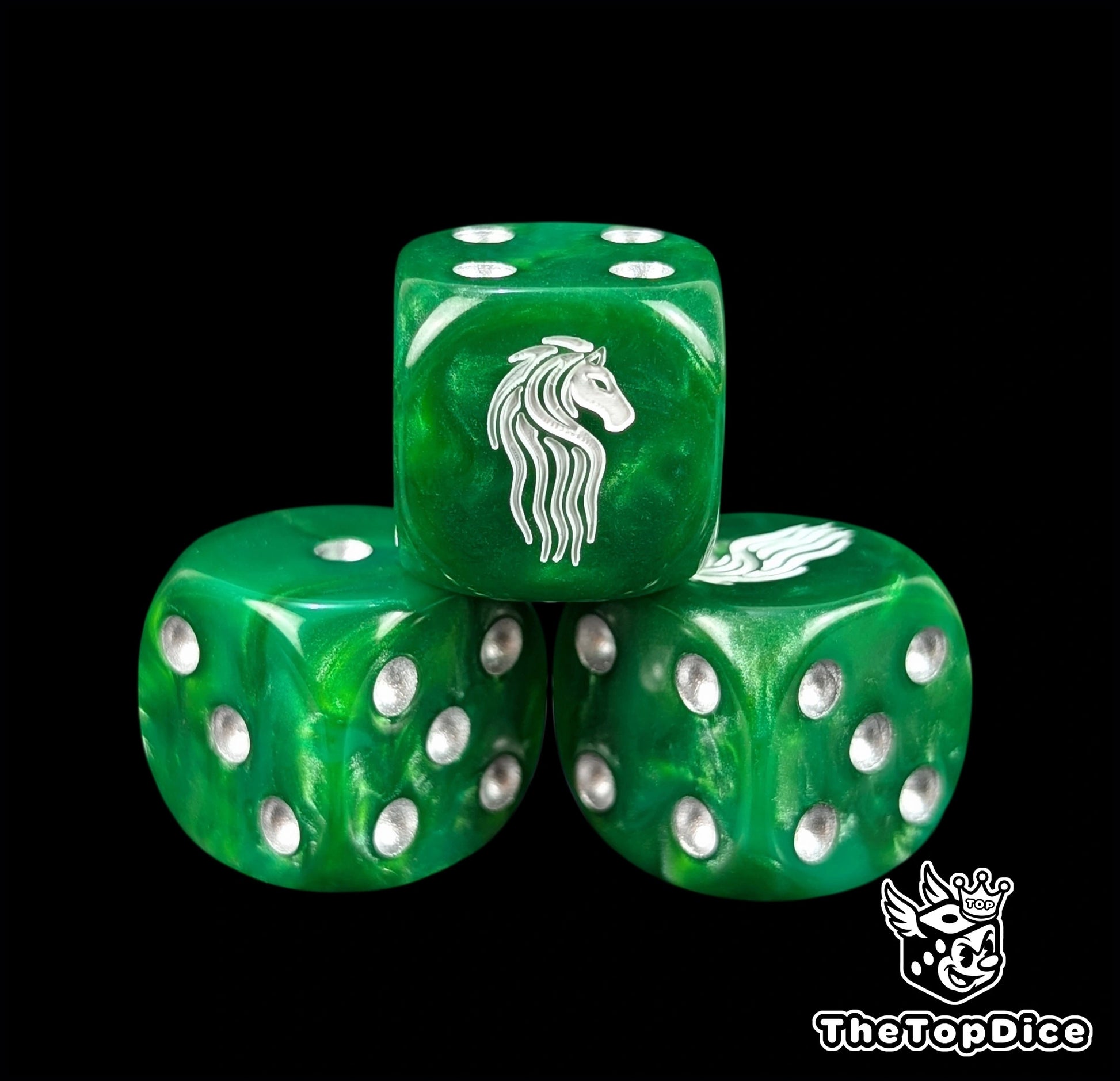 Close up of a green 16mm resin D6 die engraved with a white horse and silver pips