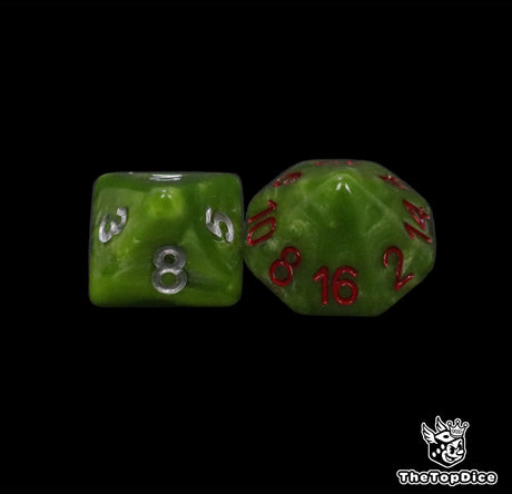 Close up of a green D8 and D16 with silver numbers for scatter and long range rolls