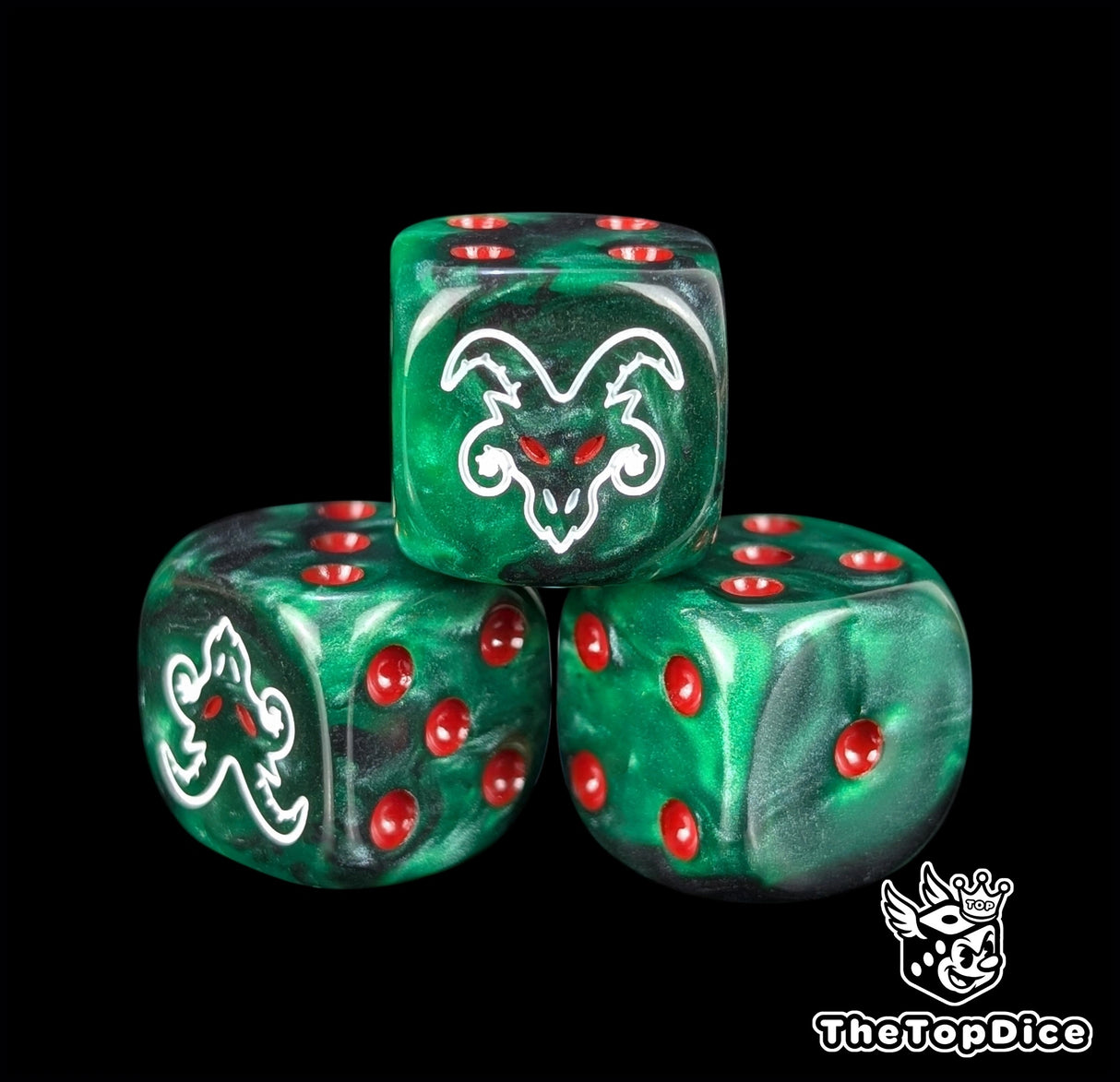 Close up of a green and black 16mm resin D6 die engraved with a white rat face and red pips