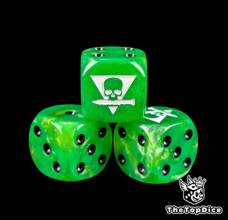 Close up of a green 16mm resin D6 die engraved with a white squad sigil and black pips