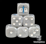Grey resin D6 dice with a white tome and blue sword emblem and white pips