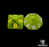 Close up of a green D8 and D16 with yellow numbers for scatter and long range rolls