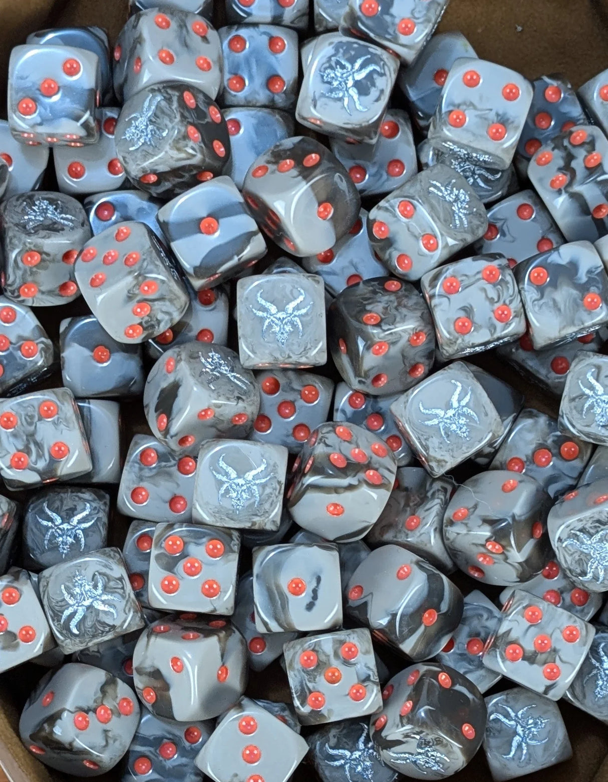 Pile of brown goat 16mm D6 dice for a fantasy beast army