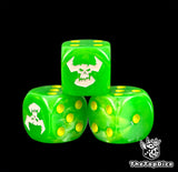 Three green orc dice with yellow pips and a white horned skull