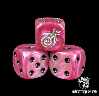 Close-up of a magenta D6 die with a silver spiral and black pips