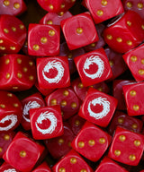 Pile of red XV Legion dice with gold pips and white coiled dragons