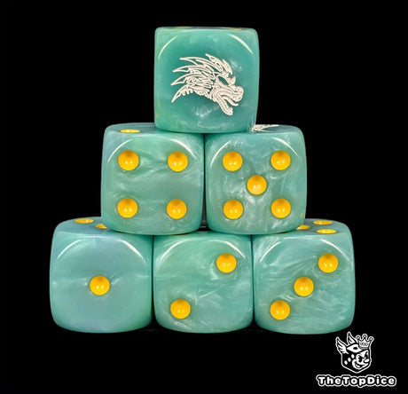 Close up of two turquoise D6 with a white feathered serpent logo on the six face for fantasy football