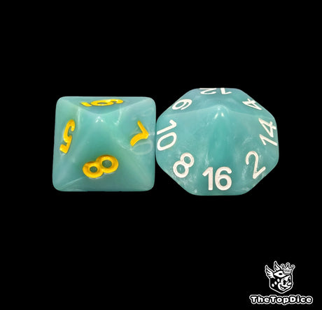 Close up of a turquoise D8 and D16 with yellow numbers for scatter and long range rolls