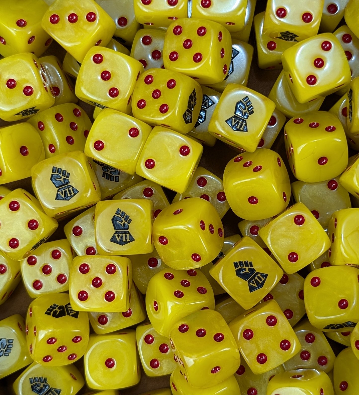 Custom yellow and black dice for Warhammer Imperial Fists forces