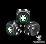 Close up of a black 16mm resin D6 die engraved with a white cross wreathed in a green laurel