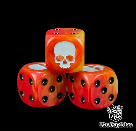 Close up of the white skull engraved and hand filled on a fire coloured Legion of the Damned 16mm D6 die