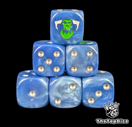Blue resin D6 dice with a green orc emblem and silver pips