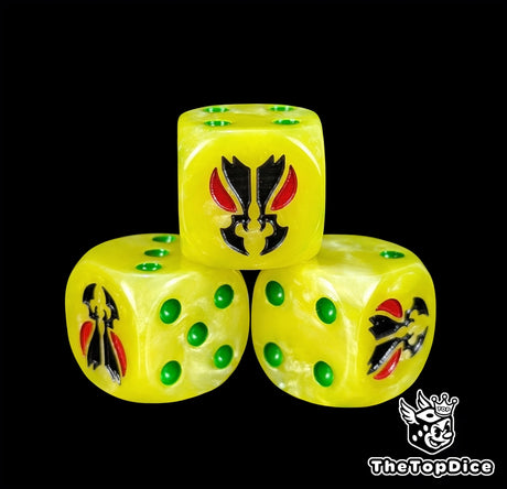 Close up of a yellow 16mm resin D6 die engraved with a black mantis face and red eyes