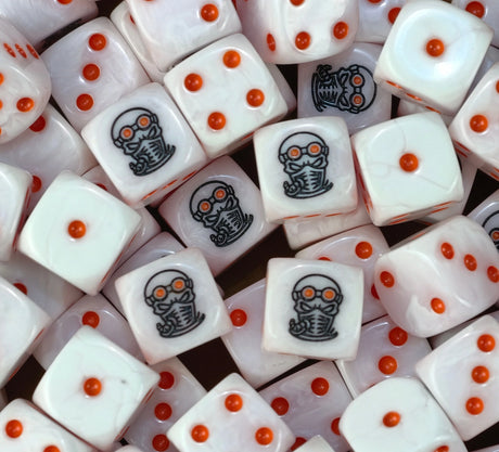 A pile of pink Genestealer Cult dice with orange pips and masked heads