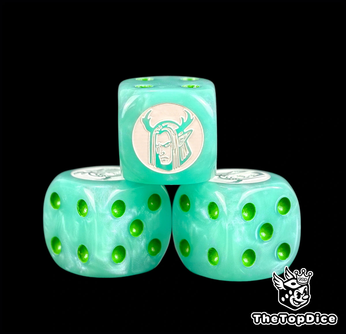 Three mint green Sylvaneth dice with a white antlered tree spirit