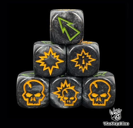 Close up of three black and grey goblin 16mm block dice with green pips for resolving blocks