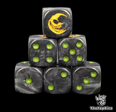 Close up of two black D6 with a yellow grinning moon logo on the six face for fantasy football