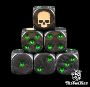 Black Mortifactors D6 dice stacked, green pips and a bone white skull on the six